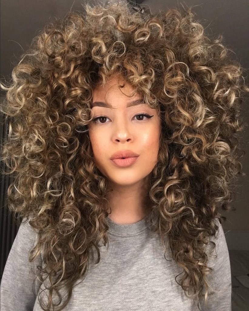 5 Effortless Thick Hairstyles That Add Volume and Style Instantly